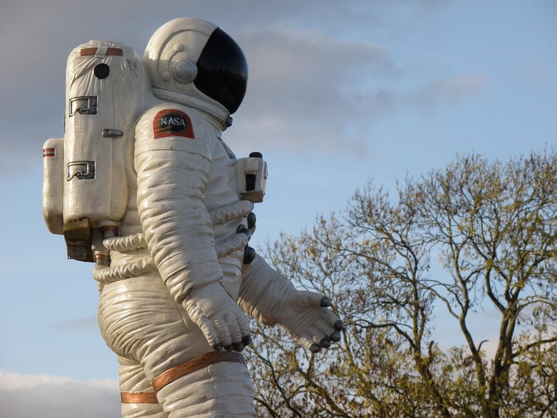 Astronaut in space with gravity boots